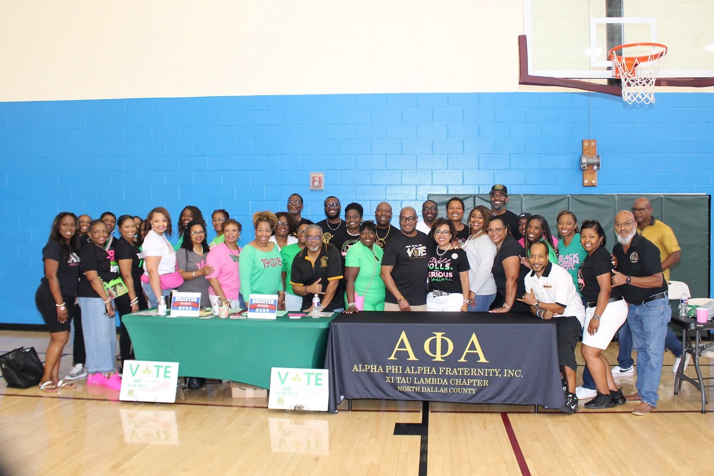Xi Tau Lambda Chapter brothers and community partners at a voter registration drive in North Dallas County